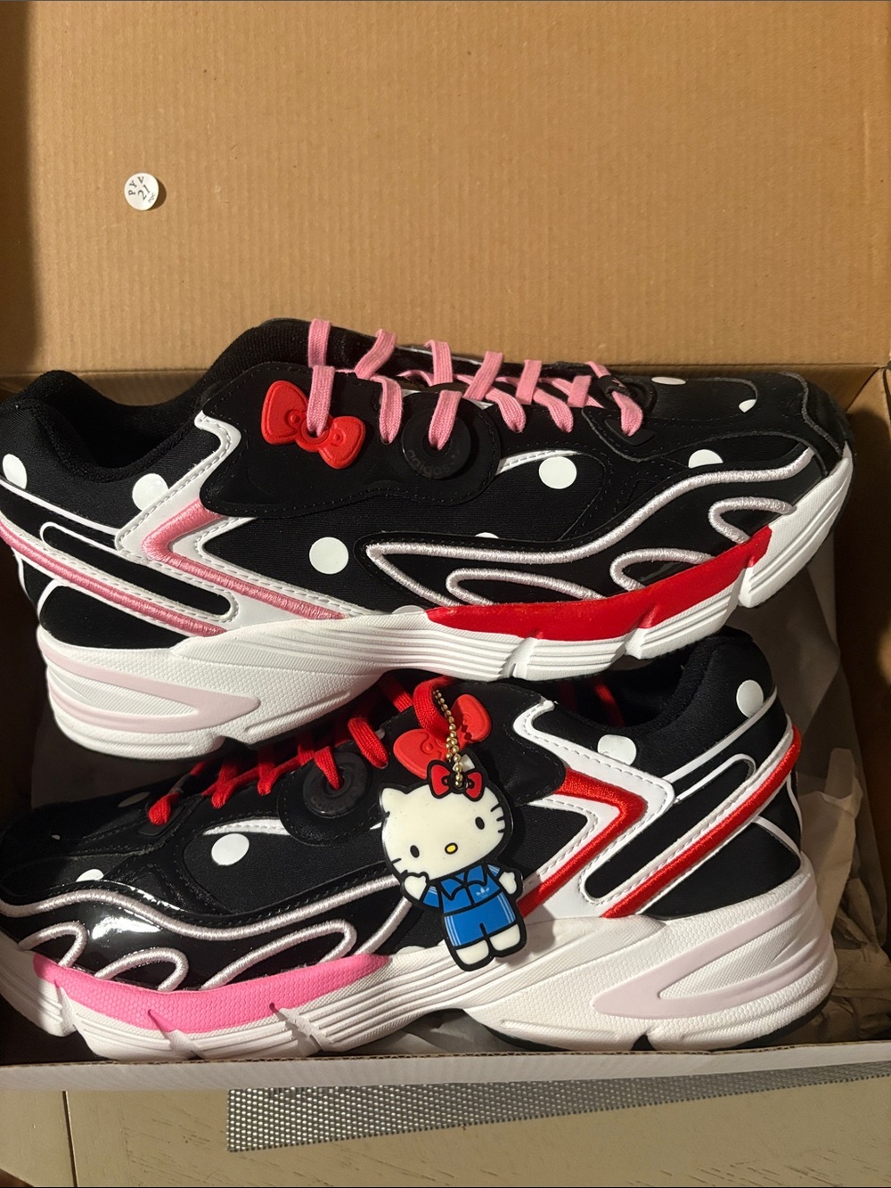 Hello Kitty Black Polka Dot Sneakers with Pink & Red Accents